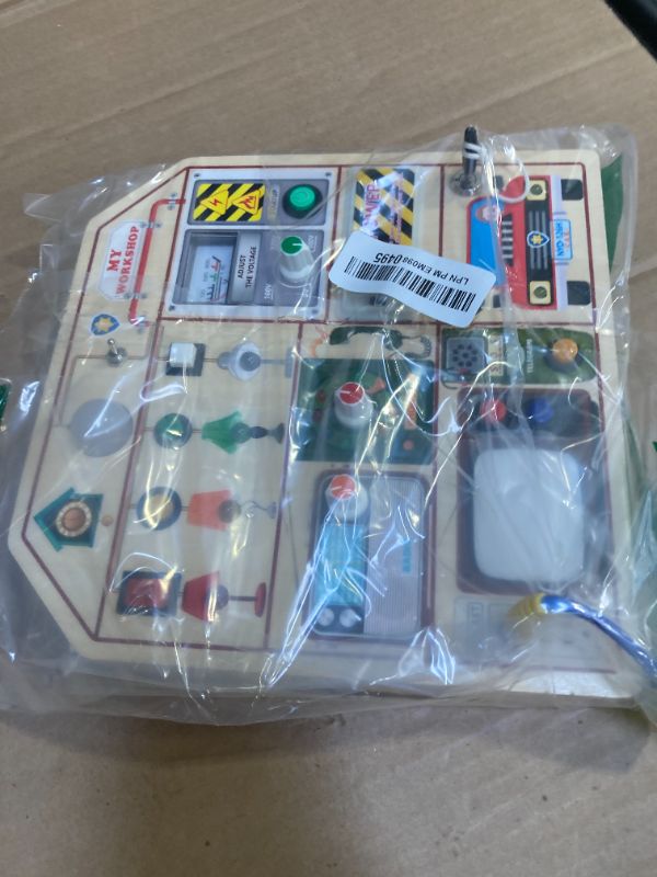 Photo 1 of JAUNTY Montessori Wooden Busy Board for Toddlers 3 4 5 Years Old, Wooden Sensory Toddler Toys with LED Light Switches, TV Radio Telegram and Car Driving, Travel Toys Birthday for Boys Girls