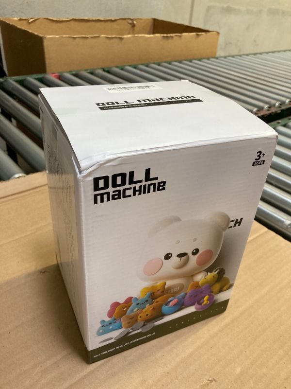 Photo 1 of Rabbit Claw Machine for Kids, Mini Vending Machine with Game Coins & Music, Prize Dispenser Toys for Girls and Boys, Electronic Claw Game Machine for Party Birthdays, Includes 30 Mini Toys