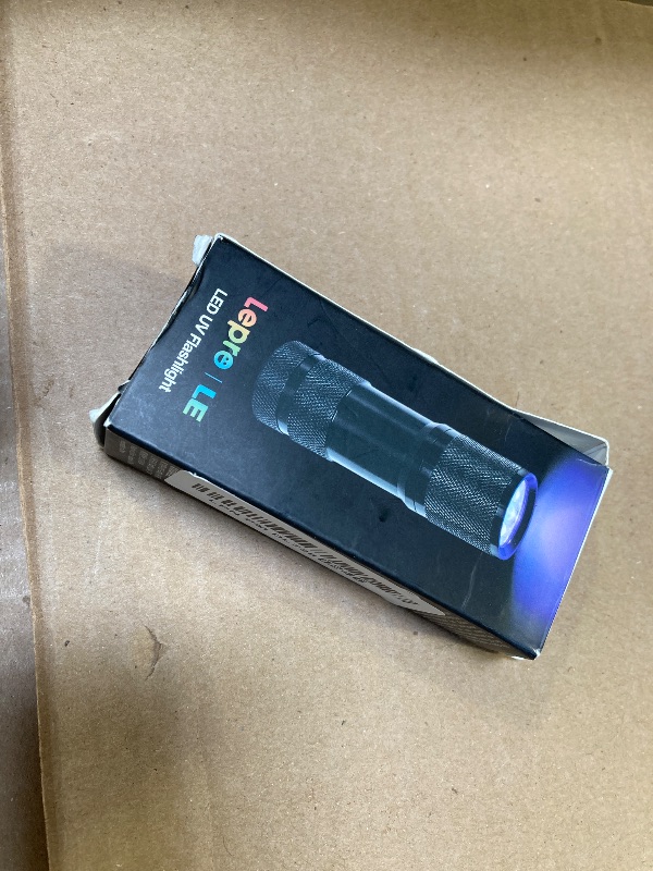 Photo 1 of Lighting EVER Black Light Flashlight, Small UV Lights 395nm, Portable Ultraviolet Light Detector for Invisible Ink Pens, Dog Cat Pet Urine Stain, AAA Batteries Included
