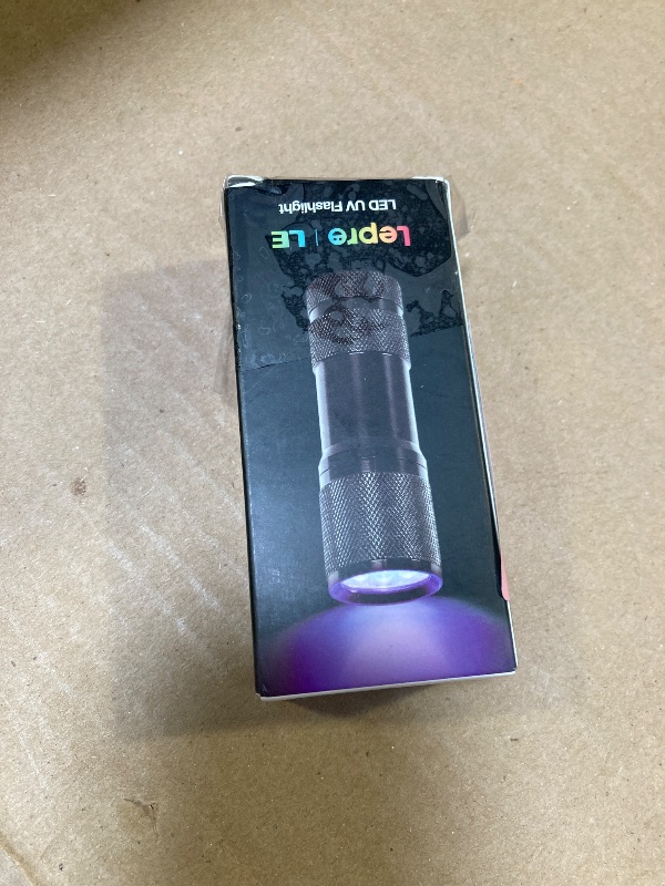 Photo 1 of Lighting EVER Black Light Flashlight, Small UV Lights 395nm, Portable Ultraviolet Light Detector for Invisible Ink Pens, Dog Cat Pet Urine Stain, AAA Batteries Included