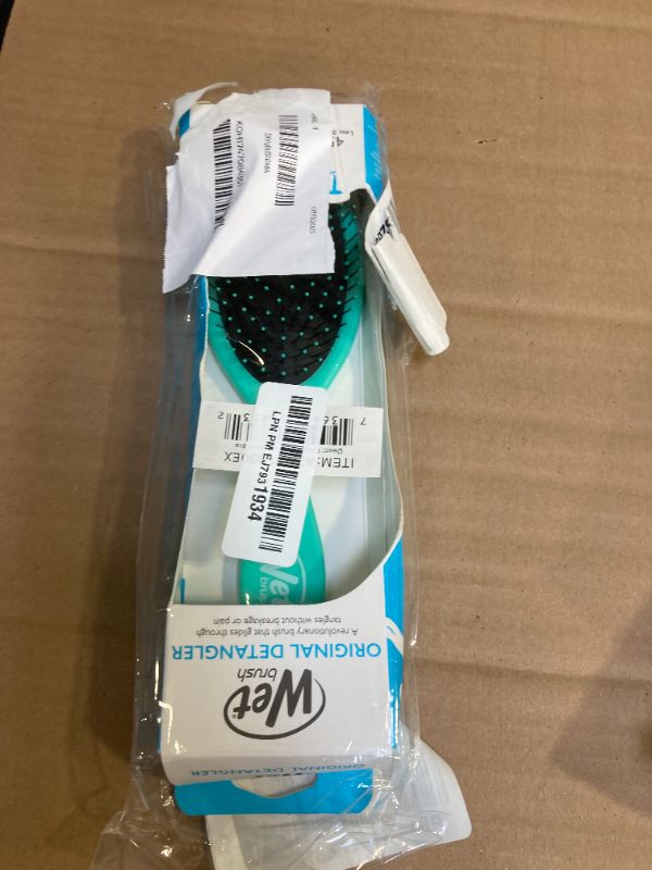 Photo 1 of Wet Brush Original Detangler Hair Brush, Amazon Exclusive Aqua- Ultra-Soft IntelliFlex Bristles-Detangling Hairbrush Glides Through Tangles For All Hair Types (Wet Dry & Damaged Hair) - Women & Men