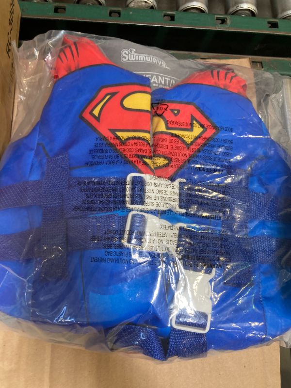 Photo 1 of SwimWays DC Swim Trainer Life Jacket, US Coast Guard Approved Life Vest Kids Swim Vest, Pool Floats & Life Jackets for Kids 33-55 lbs, Superman
