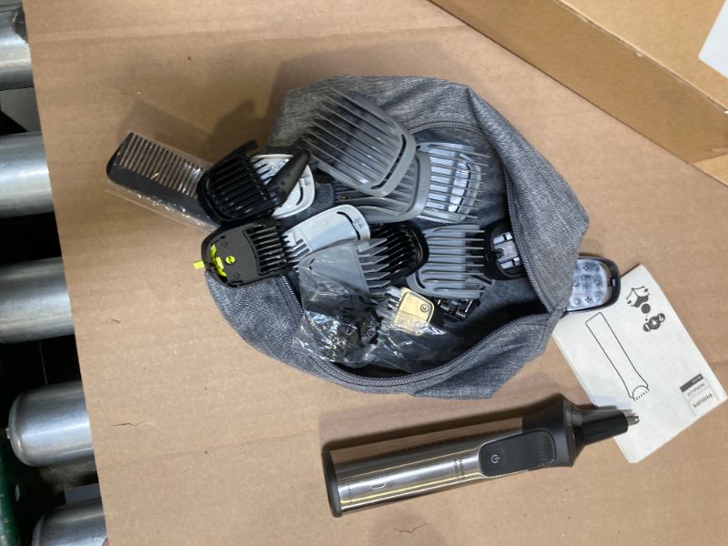 Photo 1 of Philips Norelco Multigroom 7000 Series, All-in-One Trimmer, Beard Trimmer and Hair Clipper, 23-Piece Men's Grooming Kit for Beard, Face, Nose, Ear, Body, with Titanium Blades, Travel Pouch, MG7970/49