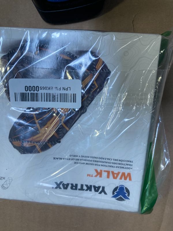Photo 1 of Yaktrax Walk Traction Cleats - 360-Degree Grip on Snow, Ice, & Multi-terrain Surfaces - Elastic Outer Band w/ Easy-On/Off Heel Tab & 1.2mm Zinc-coated Steel Coils - Abrasion & Rust Resistant - Unisex