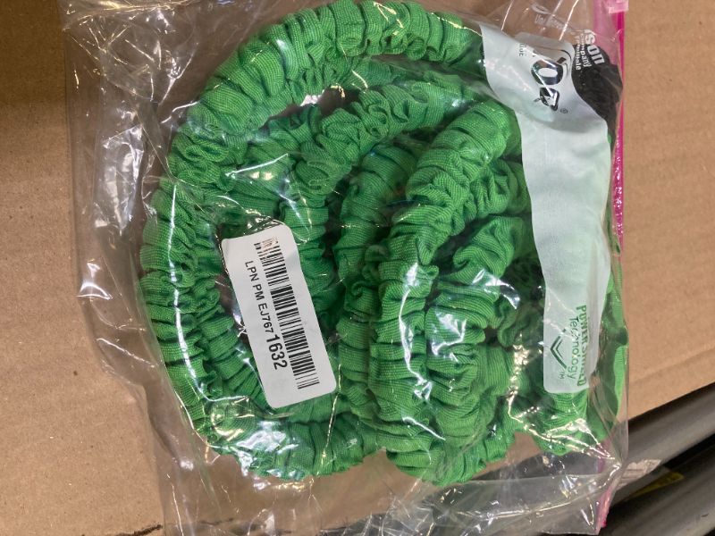 Photo 1 of Expandable Garden Hose 50 ft, Lightweight Flexible with 7 Function Nozzle Sprayer, Upgraded Latex Core & Durable Brass, Expanding Hose for Outdoor Gardening Pet Cleaning, Green