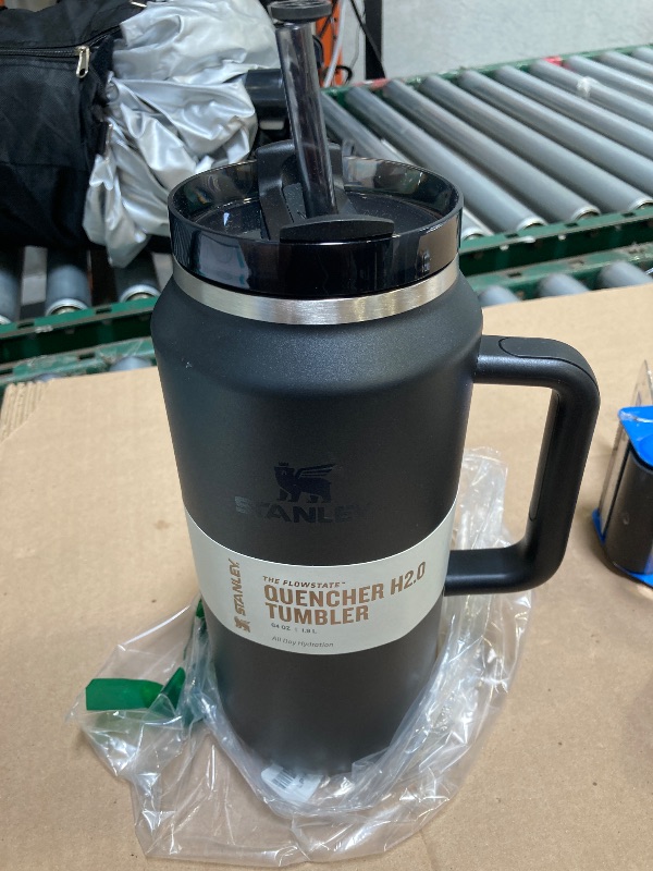 Photo 1 of STANLEY Quencher H2.0 Tumbler with Handle & Straw 64 oz | Flowstate 3-Position Lid | Large Capacity for Travel & Sports | Insulated Stainless Steel Cup | BPA-Free | Black 2.0
