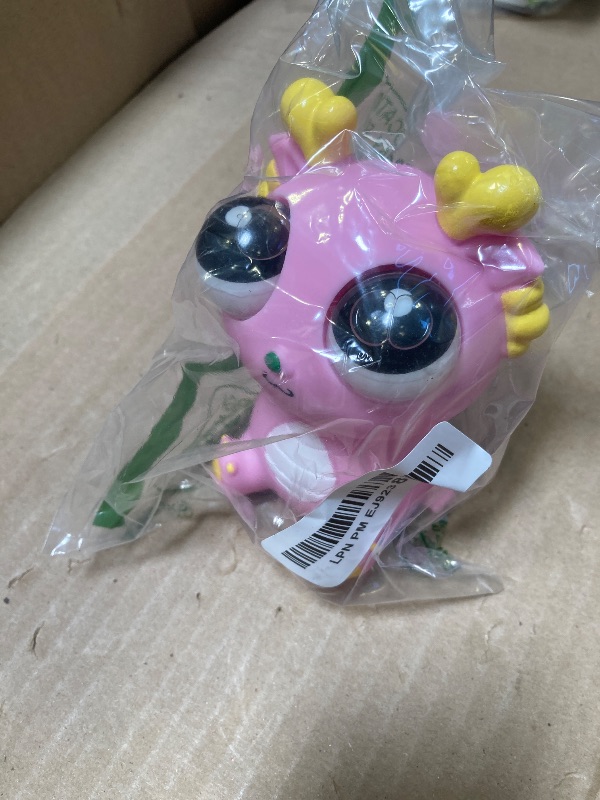 Photo 1 of 1pc  Pop-Out Eye Dragon Squeeze Toy - Stress Relief Sensory Squishy for Adults, Funny Anti-Stress Ball, Ideal Anxiety Toy for Party Favors and Gifts (Pink)