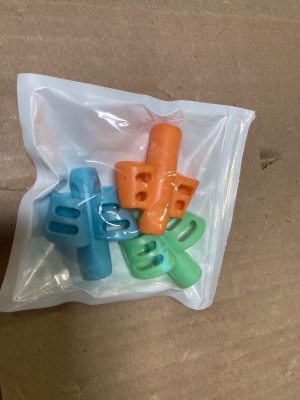 Photo 1 of JuneLsy Pencil Grips for Kids Handwriting Pencil gripper Pencil Holder Posture Correction Training Writing AIDS for preschooler Kids toddler Children Special Needs (3 PCS)