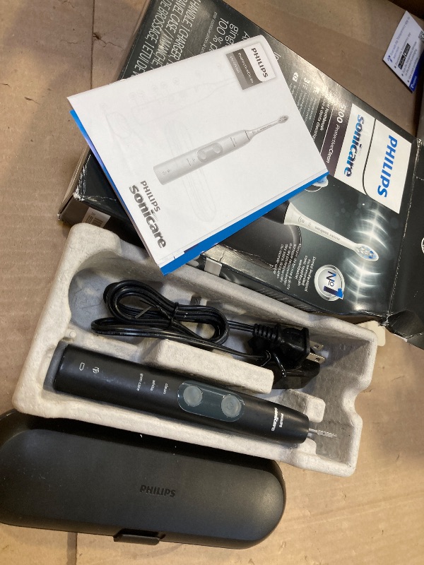 Photo 1 of Philips Sonicare ProtectiveClean 5100 Rechargeable Electric Toothbrush, with Pressure Sensor, 3 Cleaning Modes, SmarTimer and QuadPacer, 14-Day Battery Life, Travel Case, Black, Model HX6850/60