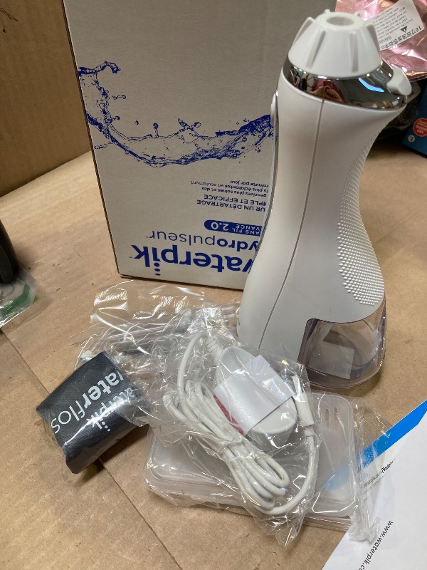 Photo 1 of Waterpik Cordless Advanced 2.0 Water Flosser For Teeth, Gums, Braces, Dental Care With Travel Bag and 4 Tips, ADA Accepted, Rechargeable, Portable, and Waterproof, White WP-580, Packaging May Vary