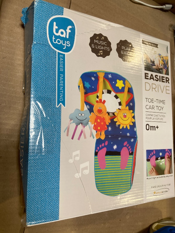 Photo 1 of Taf Toys Toe Time Infant Car Seat Toy | Kick and Play Activity Center with Music, Lights, Mirror, and Jingling Toys | Fun Travel Baby Toy for Rear Car Seat | Easier Drive with Newborns, Babies