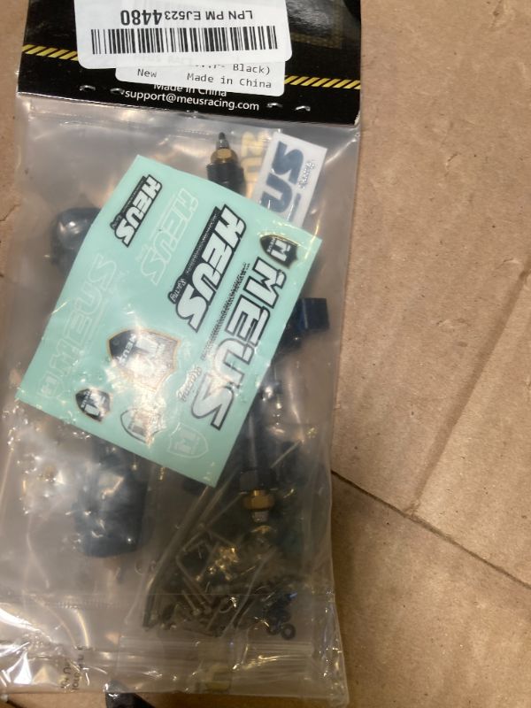 Photo 1 of MEUS RACING SCX24 Axles Isokinetic 3-Section CVD 52° Max. Steering Angle +5mm Widened SCX24 Upgrades for Axial SCX24 Deadbolt C10 JLU Gladiator Bronco 1/24 RC Crawler (Front and Rear- Black)