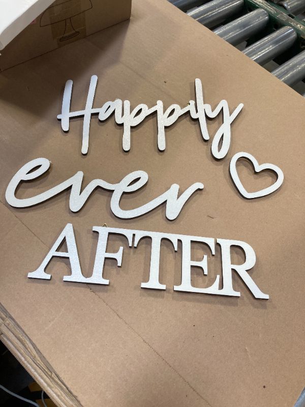 Photo 1 of Unittype 4 Pcs Happily Ever After Wall Decor Wooden Words Heart Hanging Wedding Day Plaque Sign Wedding Wood Word Cutout Sign for Crafts Happily Ever After Wall Art for Home Decor Party, White