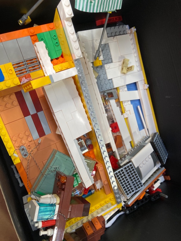 Photo 1 of FUNWHOLE Travel Trailer Lighting Building-Bricks Set - Classic Camper Van for Beach 1325 Pcs Creator Vehicle Kit for Adult and Teens