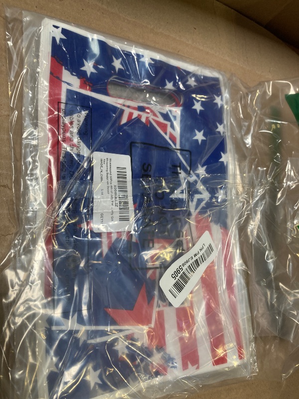 Photo 1 of Blosssound 50 Pcs Patriotic Gift Bags 4th of July Party Favor Plastic American Flag Decorative Goodies Treat Bag with Handles for Independence Day Memorial Day Party Gift Wrapping Supplies Decor