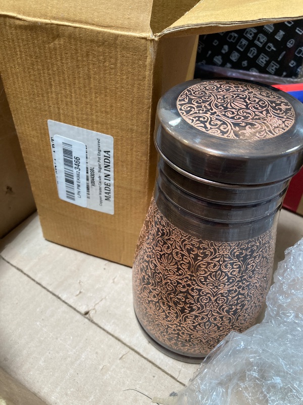 Photo 1 of Pure Copper Water Bottle for Drinking Water - Bedside Water Carafe - Copper Vessel for Sports and Yoga - Copper Gifts for Anniversary - 34 Oz