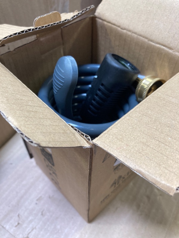Photo 1 of Coil Hose 10FT EVA Coil Garden Hose With 3/4'' Brass Connector Coiled Water Hose Lightweight And No Kink Includes 7 Patterns Spray Nozzle For Outdoors Lawn Watering Car Washing
