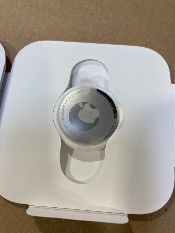 Photo 1 of Apple AirTag. Keep Track of and find Your Keys, Wallet, Luggage, Backpack, and More. Simple one-tap Set up with iPhone or iPad