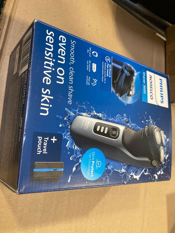 Photo 1 of Philips Norelco Shaver 3600 Series, Wet and Dry Electric Shaver, P-Cap, Travel Pouch, Storm Blue, Model S3243/91