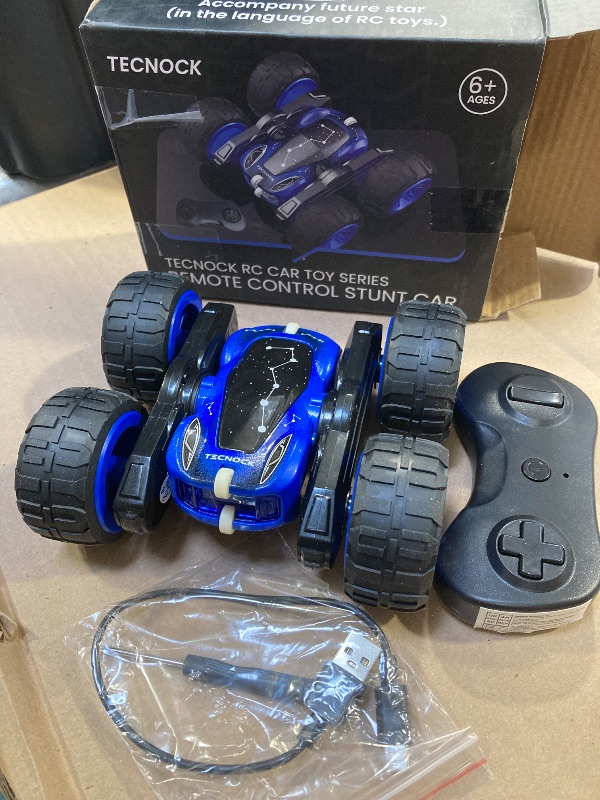 Photo 1 of Tecnock Remote Control Car, 2.4GHz RC Cars with USB-C Easy Charging, 4WD Double Sided 360° Rotates and Flips RC Stunt Car, Toys Gift for Boys and Girls