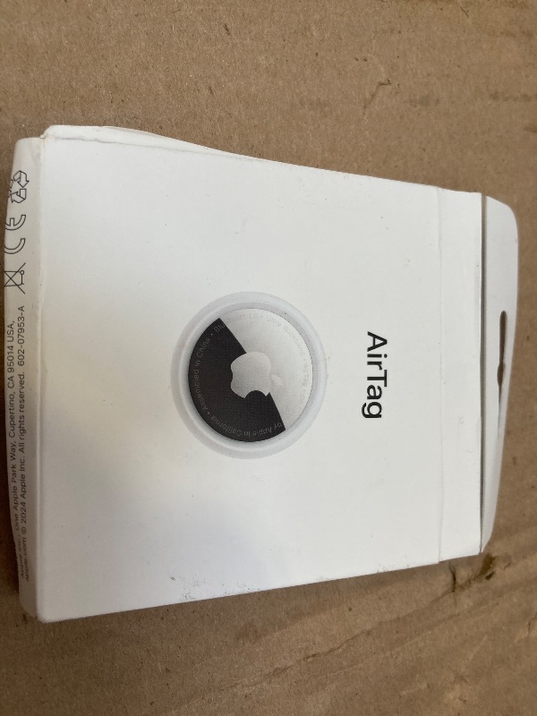 Photo 1 of Apple AirTag. Keep Track of and find Your Keys, Wallet, Luggage, Backpack, and More. Simple one-tap Set up with iPhone or iPad