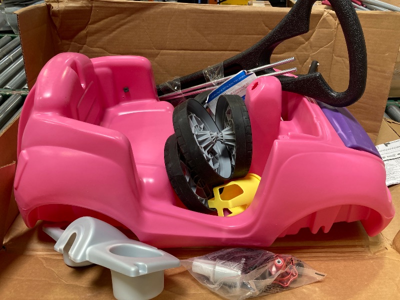 Photo 1 of Step2 Whisper Ride II Ride On Push Toy Car, Pink – Ride On Car with Included Seat Belt, Easy Storage and Transport, Makes a Great Stroller Alternative