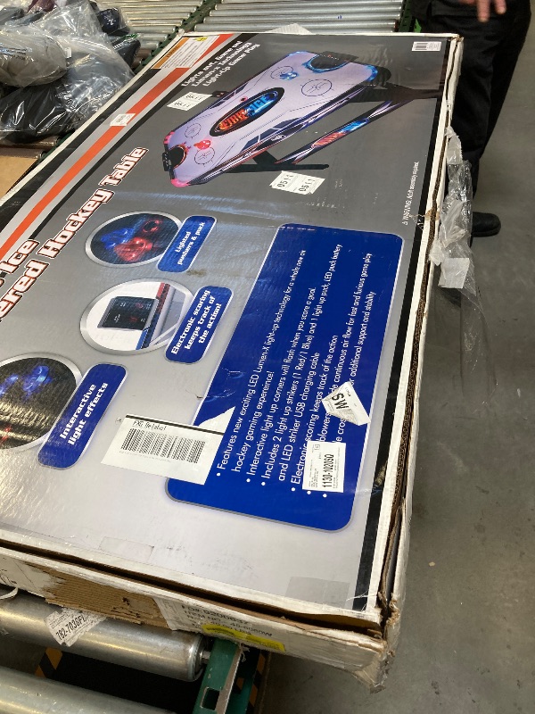 Photo 1 of Triumph Sports Fire ‘n Ice LED Light-Up 54" Air Hockey Table Includes 2 LED Hockey Pushers and LED Puck
