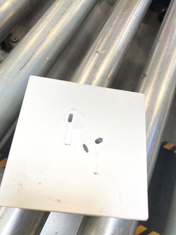 Photo 1 of USED-Needs cleaning--Apple AirPods (3rd Generation) Wireless Ear Buds, Bluetooth Headphones, Personalized Spatial Audio, Sweat and Water Resistant, Lightning Charging Case Included, Up to 30 Hours of Battery Life