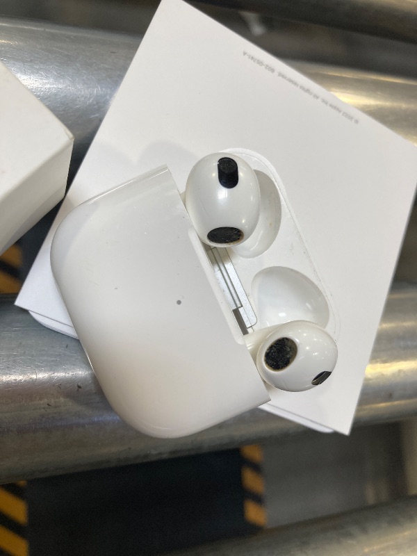 Photo 1 of USED-Needs cleaning--Apple AirPods (3rd Generation) Wireless Ear Buds, Bluetooth Headphones, Personalized Spatial Audio, Sweat and Water Resistant, Lightning Charging Case Included, Up to 30 Hours of Battery Life