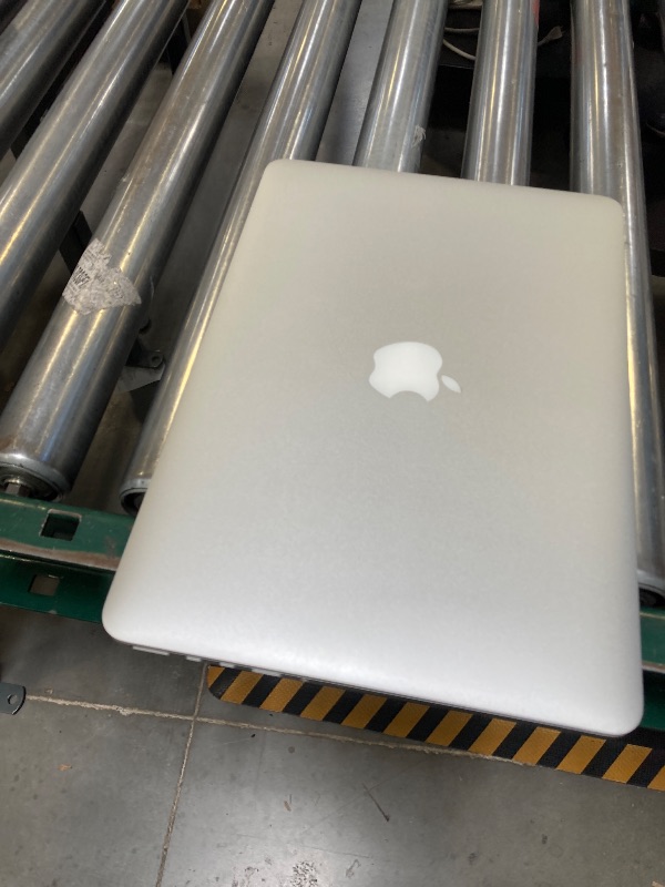Photo 1 of Apple MacBook Pro with Intel Core i5, (13.3-Inch, 8GB, 512GB) - Silver (Renewed)