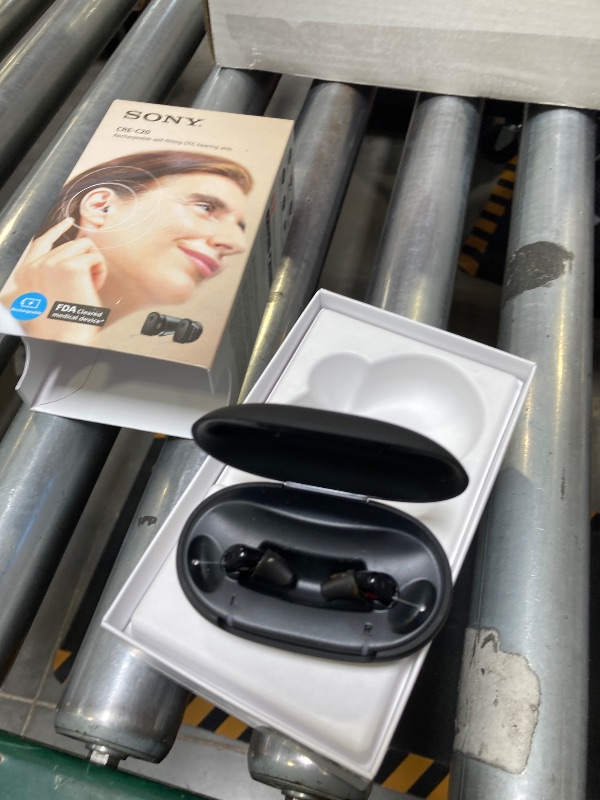 Photo 1 of USED-NEEDS CLEANING--Sony CRE-C20 Self-Fitting OTC Hearing Aids for Mild to Moderate Hearing Loss, Prescription-Grade Sound Quality, Compact Virtually Invisible Design, Customizable App, and Rechargeable Battery