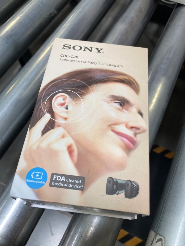 Photo 1 of USED-NEEDS CLEANING--Sony CRE-C20 Self-Fitting OTC Hearing Aids for Mild to Moderate Hearing Loss, Prescription-Grade Sound Quality, Compact Virtually Invisible Design, Customizable App, and Rechargeable Battery