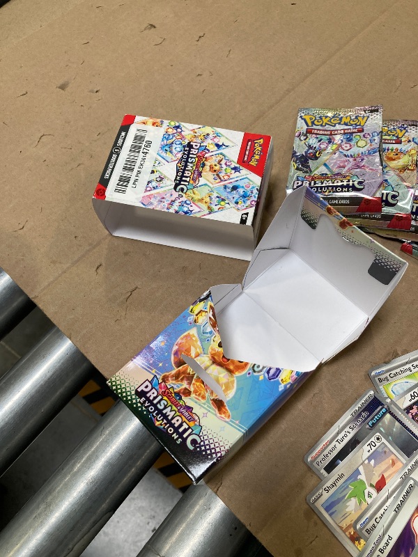 Photo 1 of OPEN PACKS MISSING CARDS-Sold as Is--Pokemon TCG: Scarlet & Violet - Prismatic Evolutions Booster Bundle