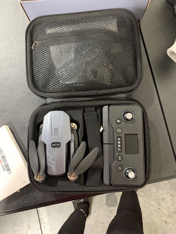 Photo 1 of POSSIBLE DAMAGE. POSSIBLY ONLY FOR PARTS -----------------------------------N11 PRO GPS Drone with Camera for Adults 4K UHD, 90 Min Long Flight Time, Auto Return, Follow Me, Long Control Range, Brushless Motor, 5G FPV RC Quadcopter for Beginners