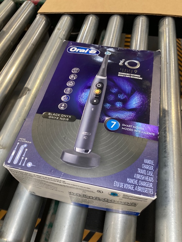Photo 1 of Oral-B iO Series 9 Electric Toothbrush with 3 Replacement Brush Heads, Black Onyx
