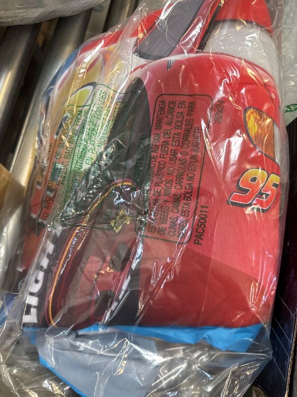 Photo 1 of Disney Cars Piston Cup Circuit Blue, Red, and Yellow, Lightning McQueen and Mater 4 Piece Toddler Bed Set - Comforter, Fitted Bottom Sheet, Flat Top Sheet, and Reversible Pillowcase