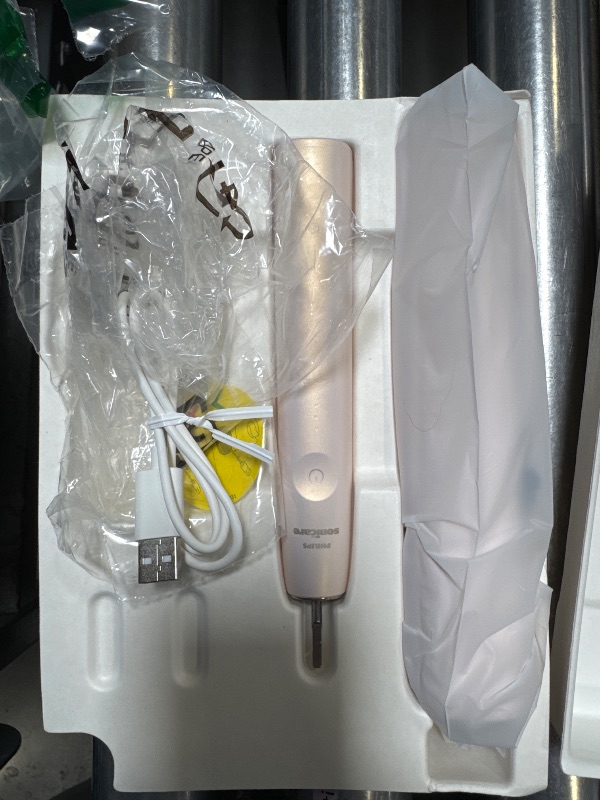 Photo 1 of Philips Sonicare DiamondClean Prestige 9900 Rechargeable Electric Toothbrush with SenseIQ, 5 Premium All-in-One Brush Heads, Plaque Removal, Gum Care, Whitening, Champagne, BD9001AZ