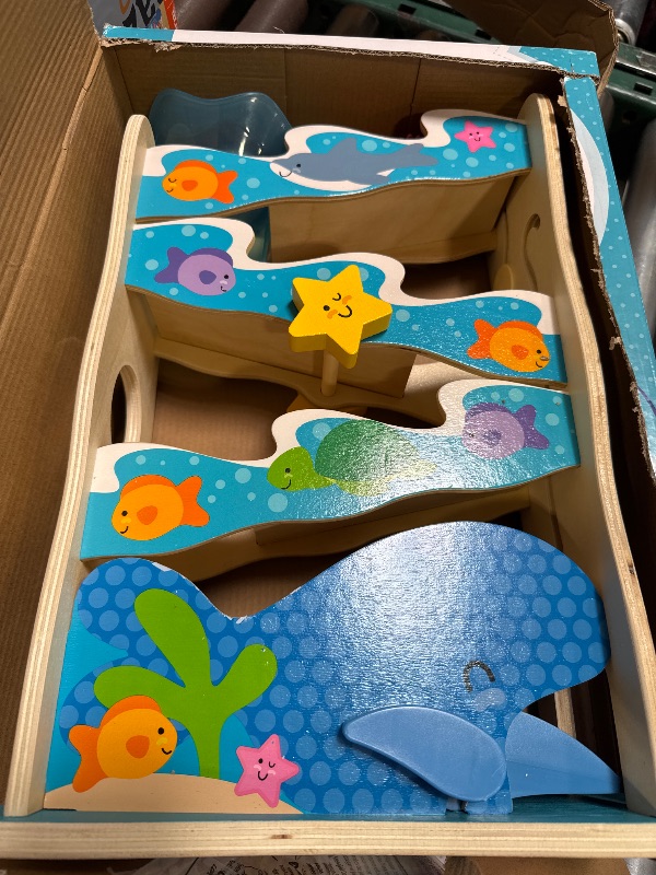 Photo 1 of Melissa & Doug Rollables Wooden Ocean Slide Infant and Toddler Toy (5 Pieces) - FSC Certified