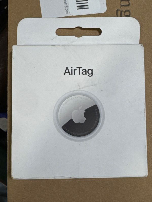 Photo 1 of Apple AirTag. Keep Track of and find Your Keys, Wallet, Luggage, Backpack, and More. Simple one-tap Set up with iPhone or iPad