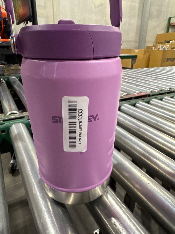 Photo 1 of Stanley IceFlow Flip Straw Jug with Handle 40 oz| Twist On Lid and Flip Up Straw | Leak Resistant for Travel and Sports | Insulated Stainless Steel | BPA-Free | Lilac