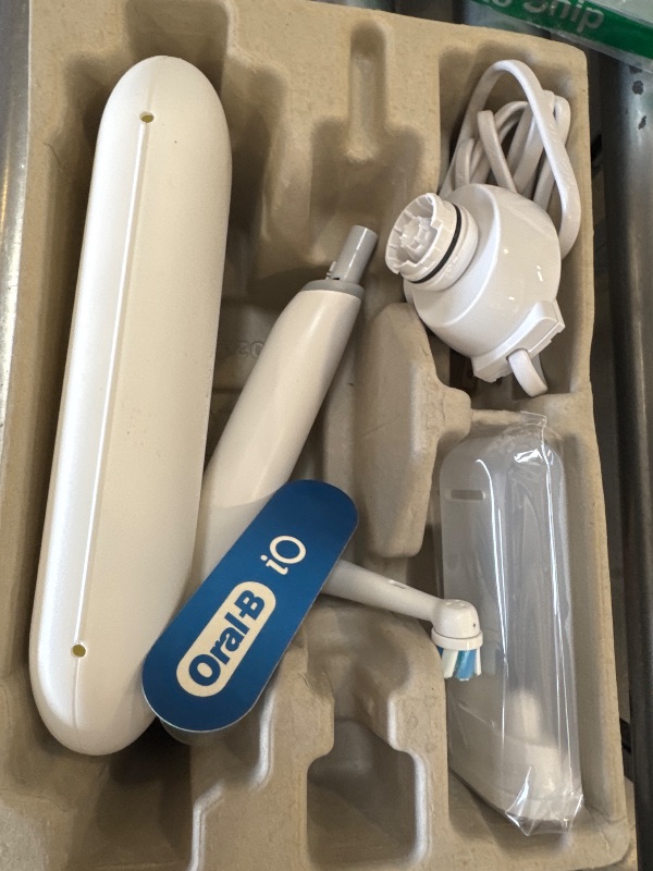 Photo 1 of Oral-B iO Deep Clean Rechargeable Electric Powered Toothbrush, White with iO Series 3 Limited, 2 Brush Heads and Travel Case - Pressure Sensor to Protect Gums - 3 Cleaning Settings - 2 Minute Timer