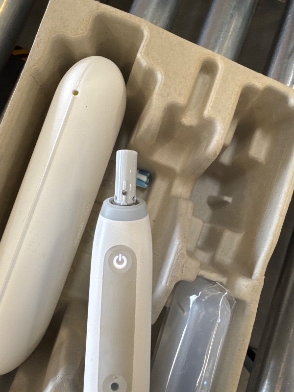 Photo 1 of Oral-B iO Deep Clean Rechargeable Electric Powered Toothbrush, White with iO Series 3 Limited, 2 Brush Heads and Travel Case - Pressure Sensor to Protect Gums - 3 Cleaning Settings - 2 Minute Timer