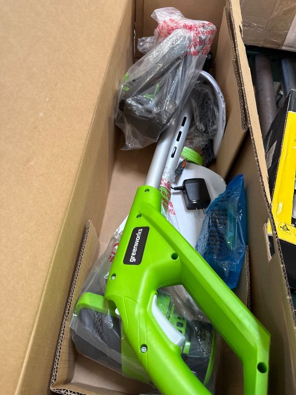 Photo 1 of Greenworks 24V 12 inch String Trimmer, 2Ah USB Battery and Charger Included ST24B215