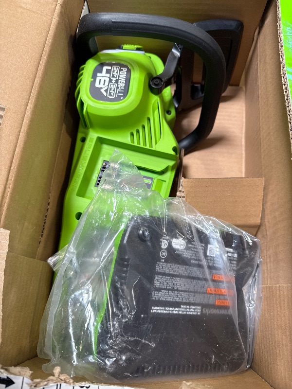 Photo 1 of Greenworks 48V (2 x 24V) 16" Brushless Cordless Chainsaw (Great For Tree Felling, Limbing, Pruning, and Firewood / 125+ Compatible Tools), (2) 4.0Ah Batteries and Dual Port Rapid Charger Included