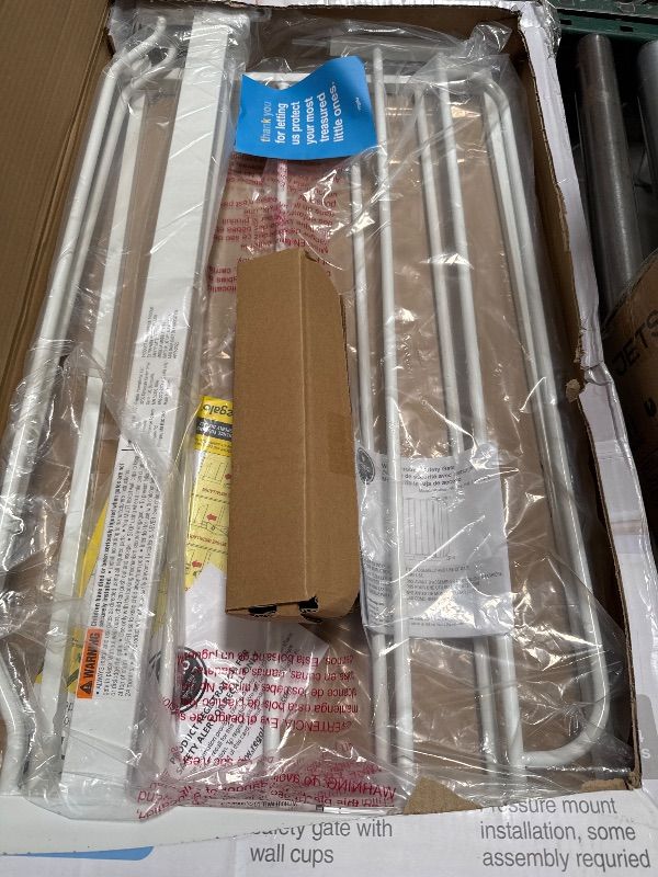 Photo 1 of Regalo Extra Wide Walk Through Baby Gate, with Included Extension Kits