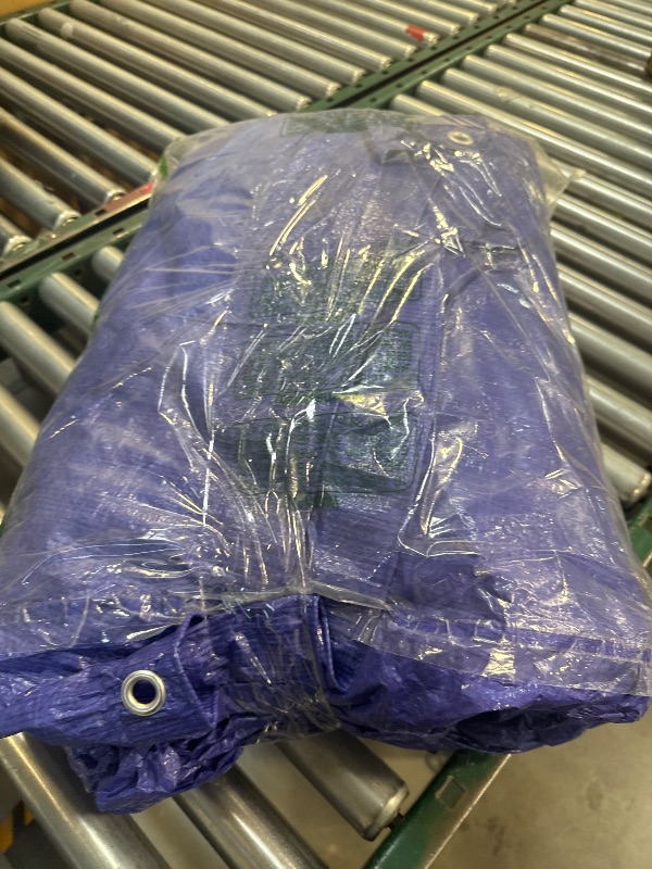 Photo 1 of Blue Tarp (Unknown Size)