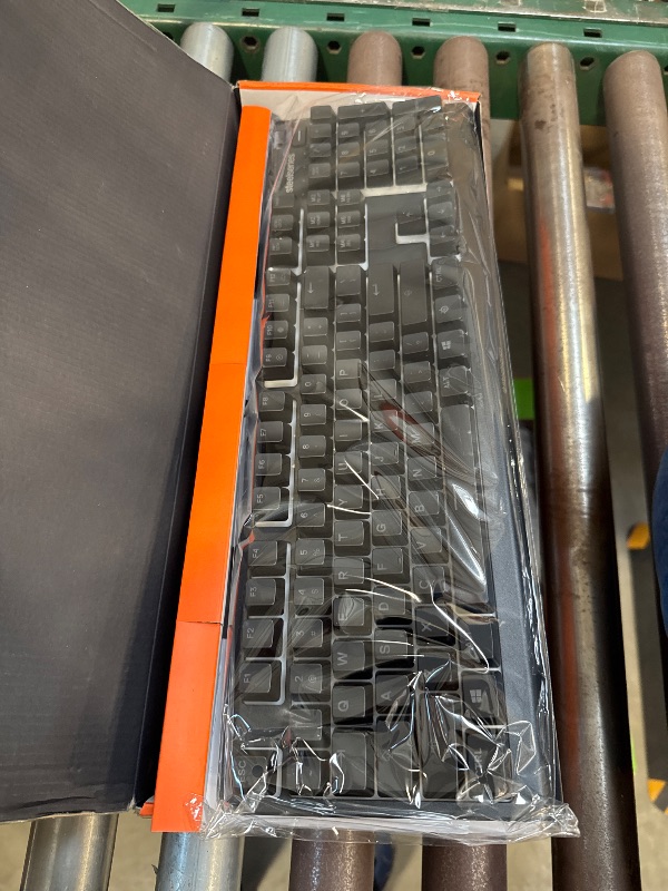 Photo 1 of SteelSeries Apex 3 RGB Gaming Keyboard – 10-Zone RGB Illumination – IP32 Water Resistant – Premium Magnetic Wrist Rest (Whisper Quiet Gaming Switch)