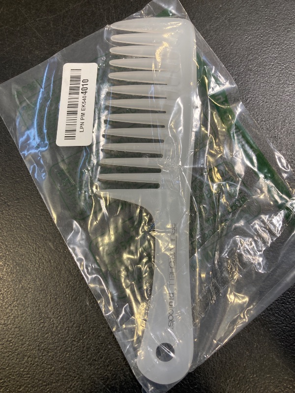 Photo 1 of Paul Mitchell Pro Tools Detangler Comb, Wide Tooth Comb Detangles Wet or Dry Hair Milky White