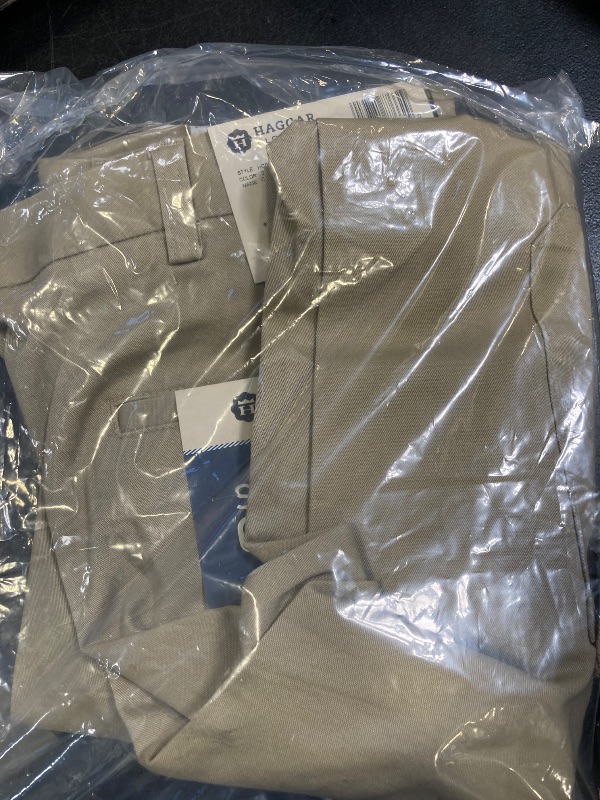 Photo 1 of Haggar men's Comfort Stretch Flat Front Cargo -Ã‚ Reg. and Bt Casual Pants, Khaki, 36W x 29L US