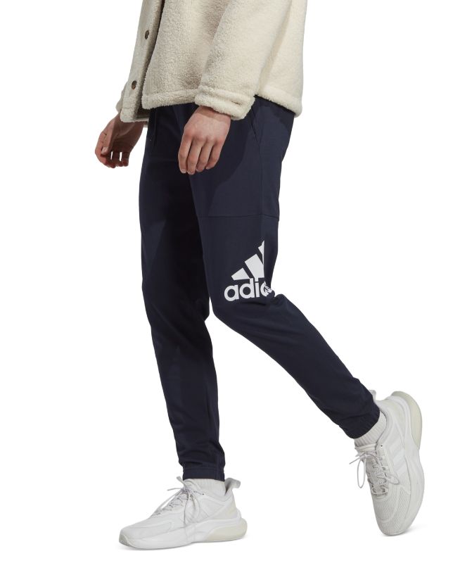 Photo 1 of Men's Adidas Essentials Badge of Sport Jersey Tapered Pants, Size: Large, Dark Blue